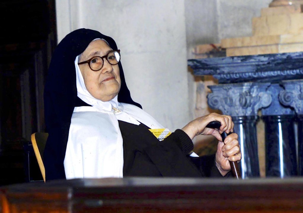 Sister Lucia dos Santos, one of the three children who saw Our Lady of Fatima in 1917, is pictured in a 2000 photo. Bishop Virgilio Antunes of Coimbra, Portugal, formally closed the local phase of investigation into her life and holiness Feb. 13 in the Carmelite convent of St. Teresa in Coimbra, where she resided until her death in 2005 at the age of 97. (CNS photo/Paulo Carrico, EPA) See FATIMA-LUCIA-CAUSE Feb. 14, 2017.