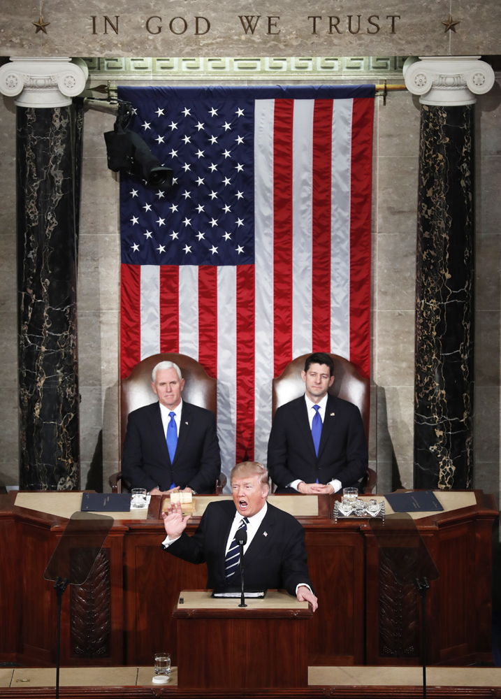 Vice President Mike Pence and U.S. House Speaker Paul Ryan, R-Wis., look on as President Donald Trump delivers his first address to a joint session of Congress Feb. 28 in Washington. (CNS photo/Michael Reynolds, EPA)